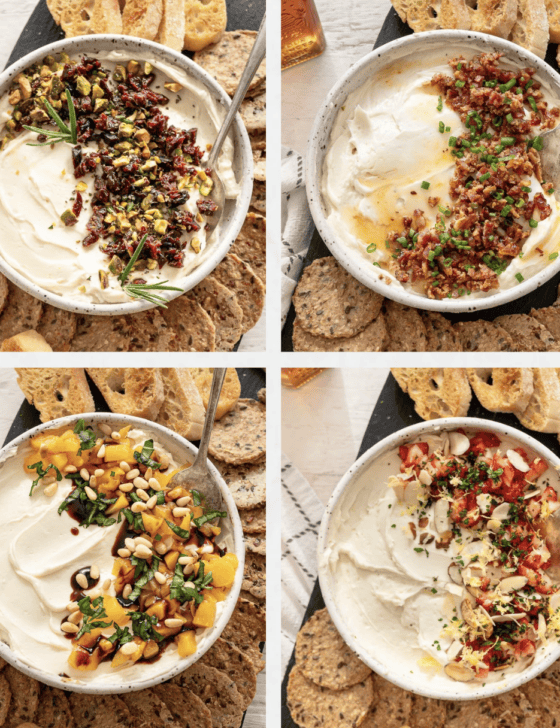 Four bowls of different variations of Honey Whipped Goat Cheese served with sliced baguettes.